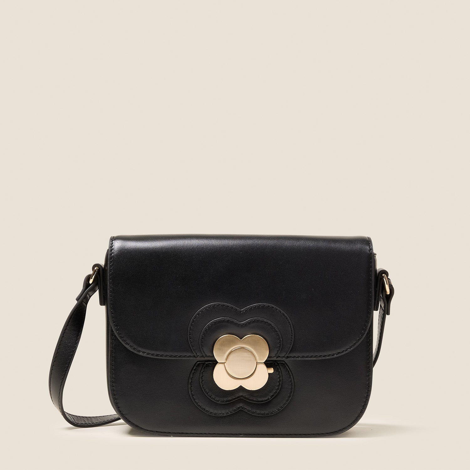 25AEFLA990-0010_EclipseLeatherCrossbody-FlowerAppliqueBlack1_3a38b60c-6cad-4883-95c0-ac0d4e03b259